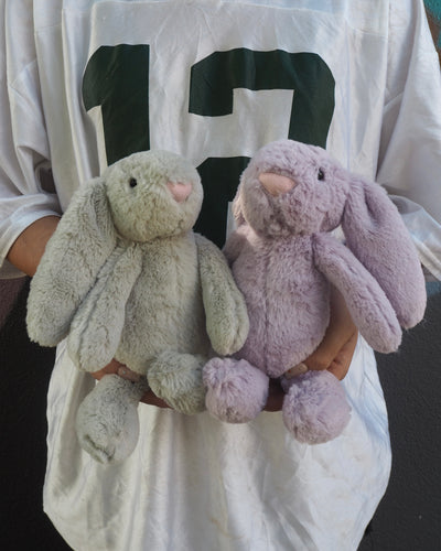 Two plush long ear bunny rabbits, one in grey and one in lilac colour available for Adelaide Delivery