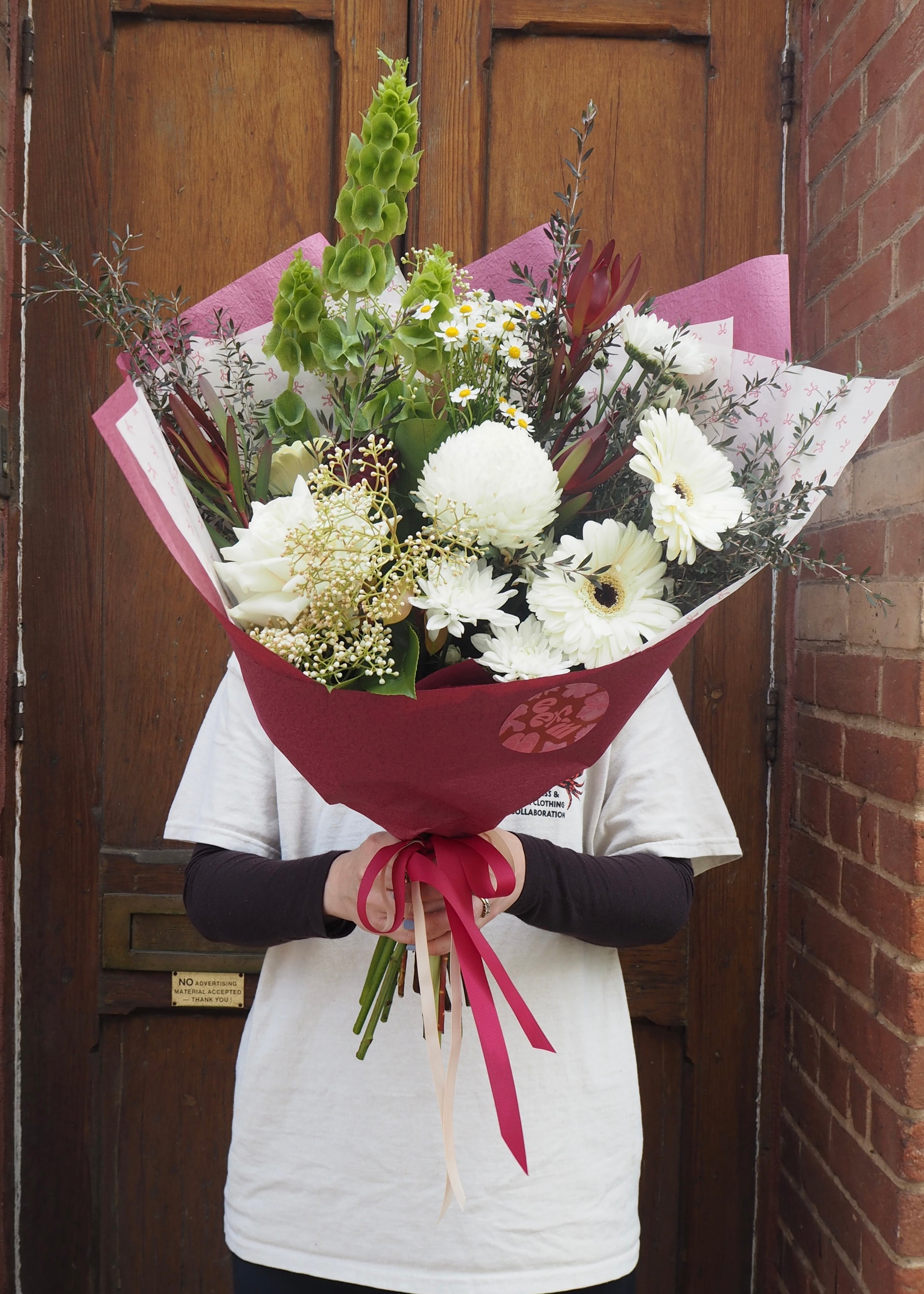 The Garnet Christmas Florist Choice Bouquet