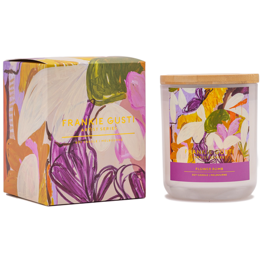 Candle with floral design packaging and Frankie Gusti branding