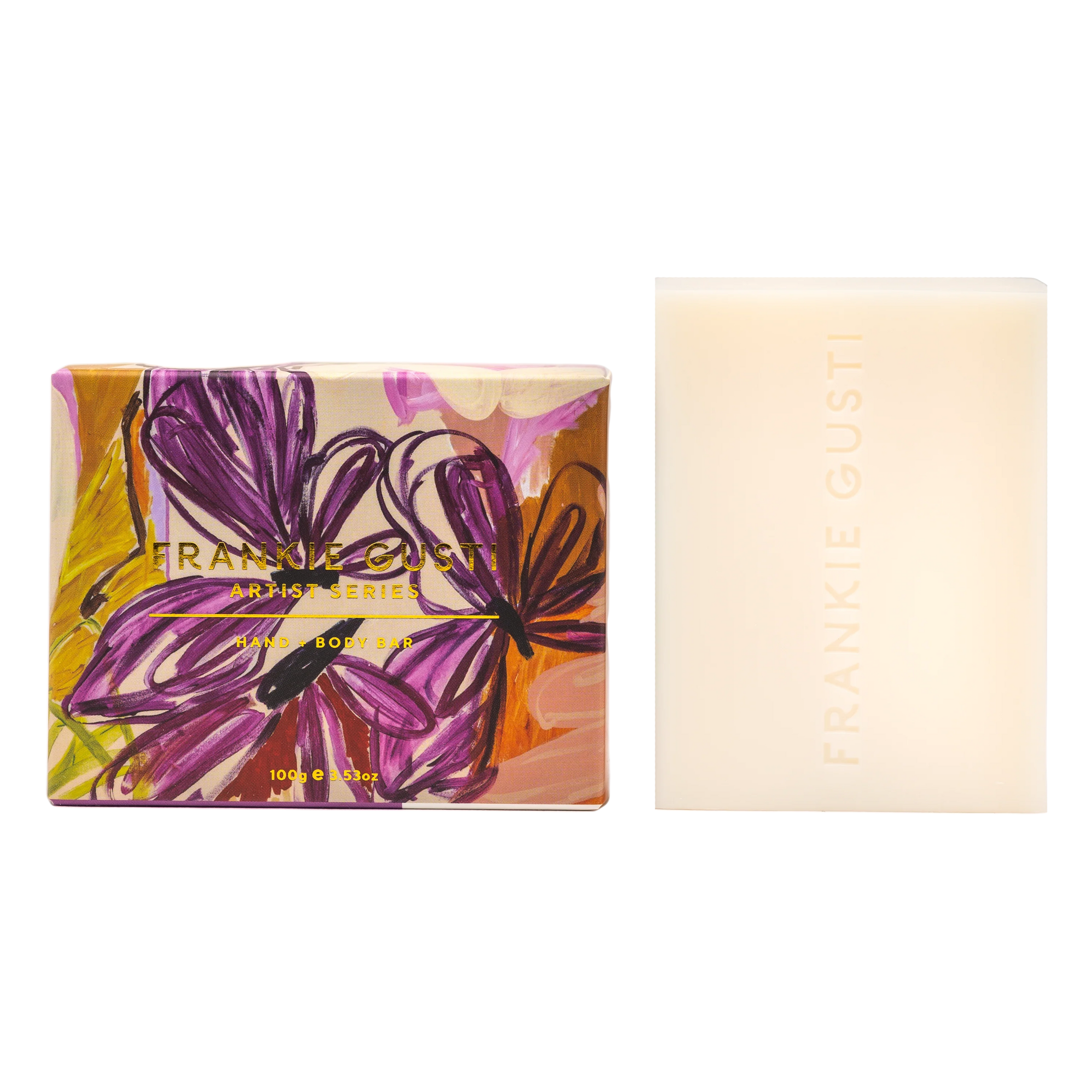 Bar of soap with a decorative box featuring floral design on a white background