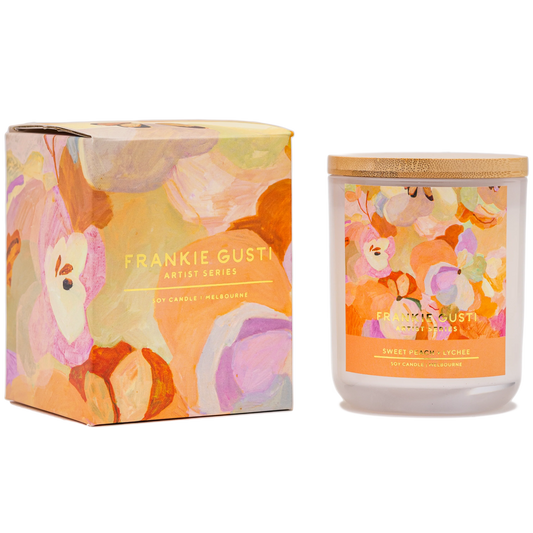 Floral candle and packaging by Frankie Gusti on a white background