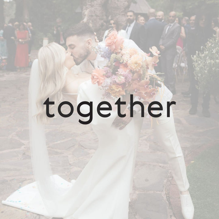 image of bridal couple kissing with flowers and text 'together' overlaid 